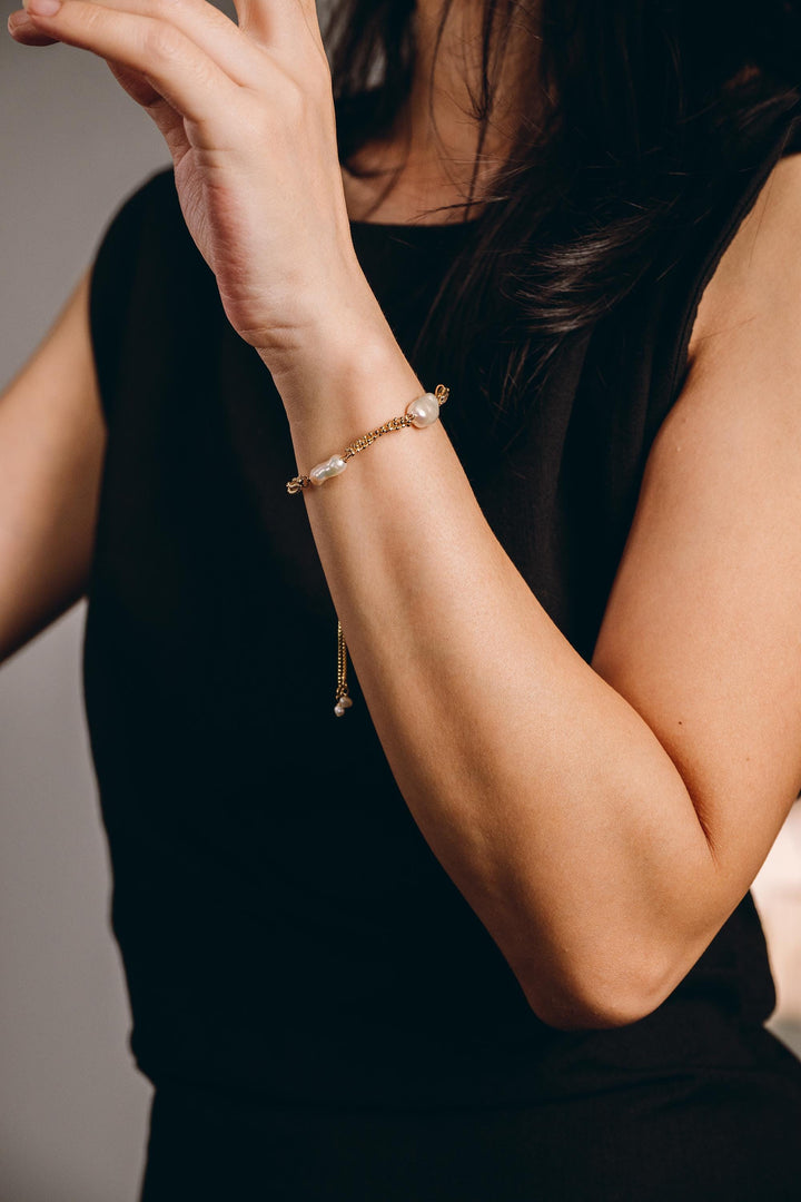 Dainty gold pearl bracelet: dashed freshwater Keshi pearls, adjustable gold-filled tassel