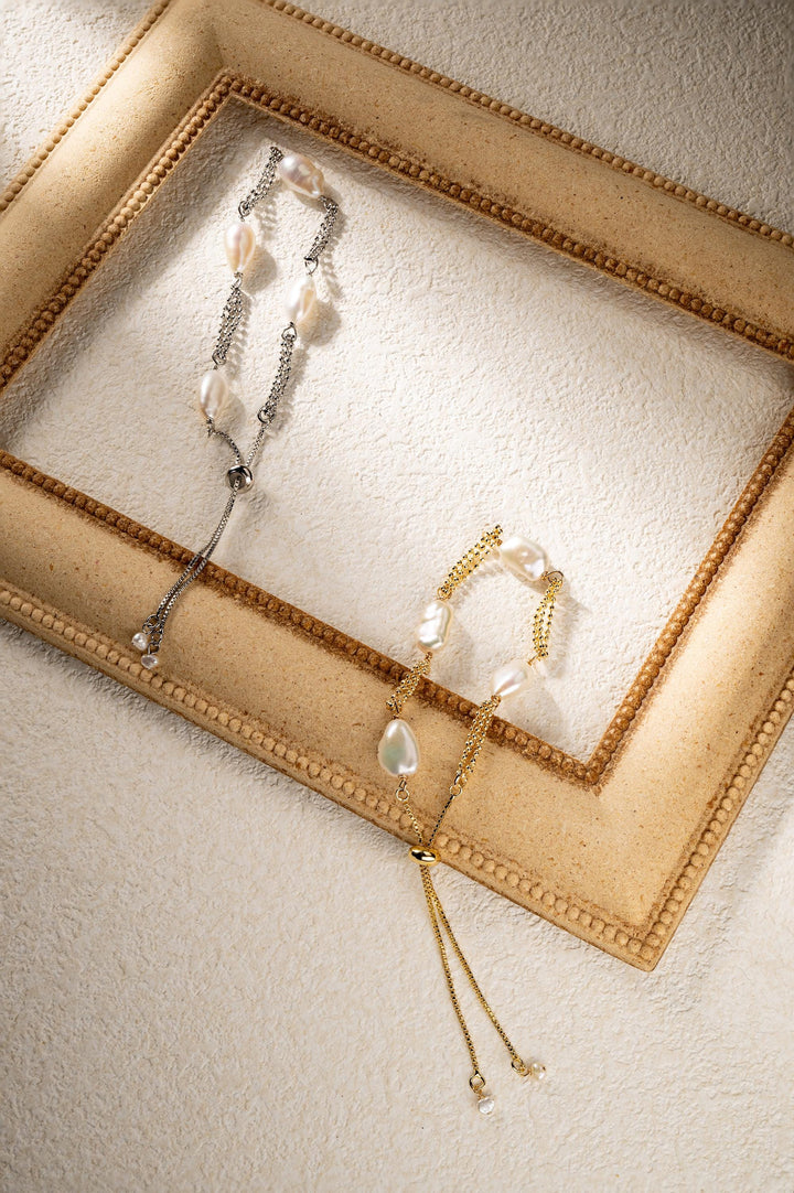 Dainty gold pearl bracelet: dashed freshwater Keshi pearls, adjustable gold-filled tassel